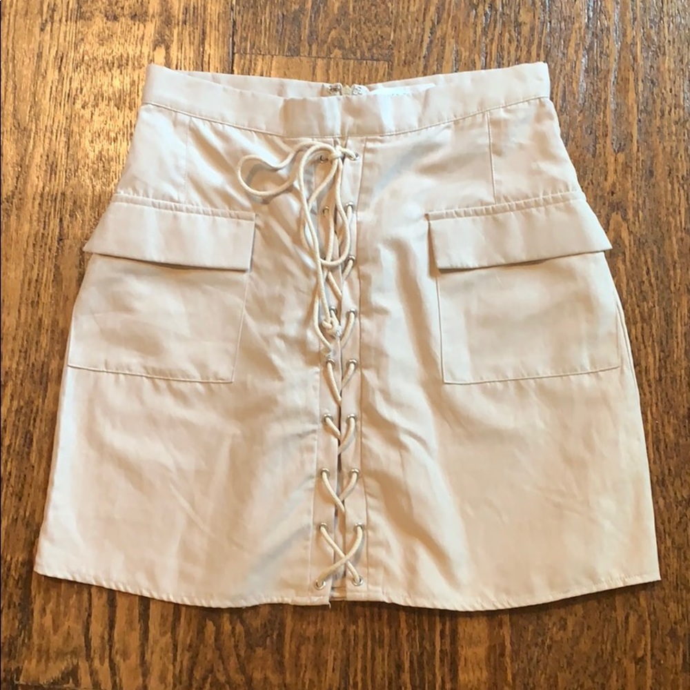 Nude mini skirt